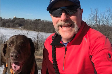 Clint Miller, Midwest Project Director, with his dog Zeke