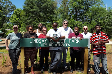 Shannon Lee joined by staff members from several grant recipients at Lindsay Street Park.