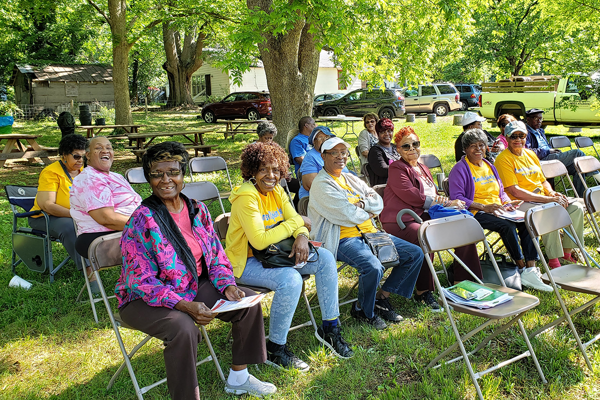 Senior community members gather in Atlanta for a chair fitness and herbal tea making class at the Urban Food Forest At Browns Mill in Atlanta. Photo by Vickie Beene.