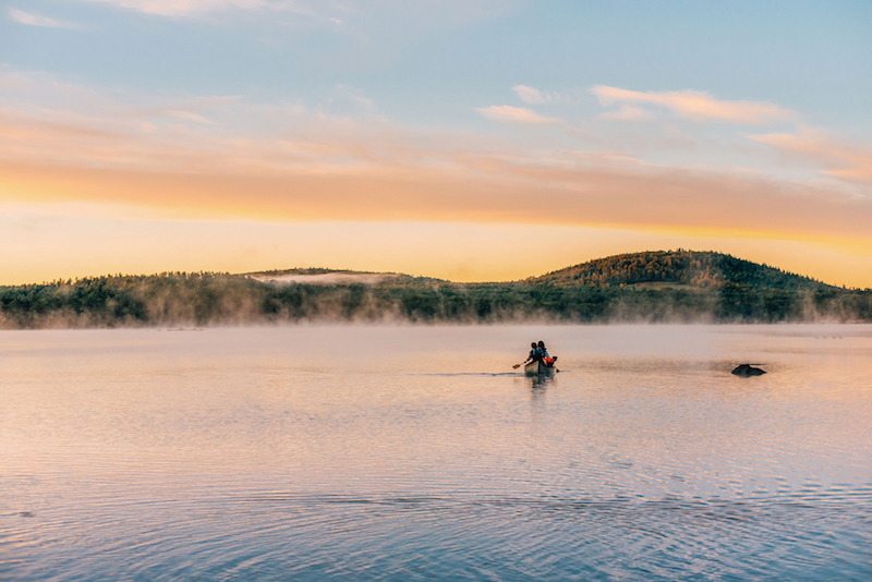 Canoeing on Keoka Lake a water body in Waterford, Maine, that is in the Sebago Lake watershed.